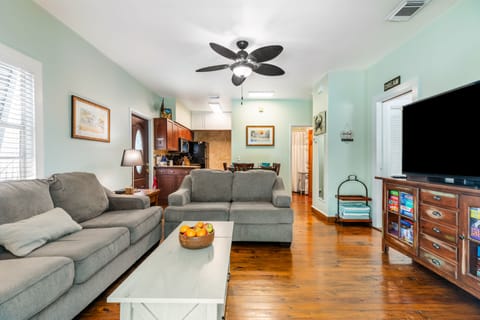 Living area with ceiling fans.
