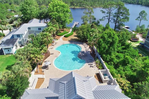 A heated pool, sun loungers