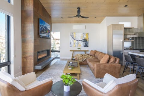 Plush living room with modern leather furniture