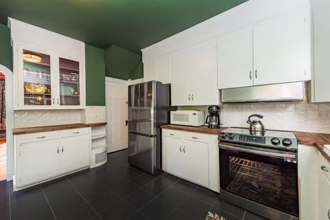 Our cabinets are stocked with everything you'll need to cook a feast -- salad spinner and blender included!