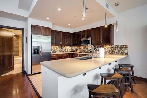 Kitchen with bar-style seating