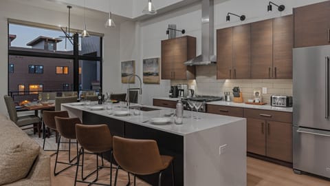 Kitchen, Main Level - Gourmet kitchen with breakfast bar seating