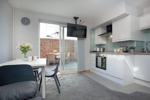 Open plan living space | Garden Apartment - New Esplanade Court, Paignton