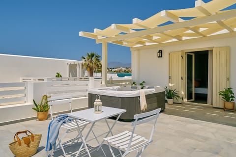 Savor the exclusive retreat of a private balcony and jacuzzi