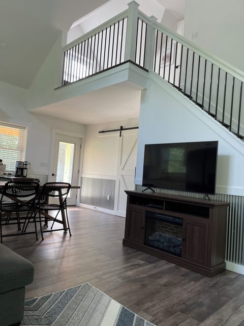 Stairway to sitting area and second bedroom