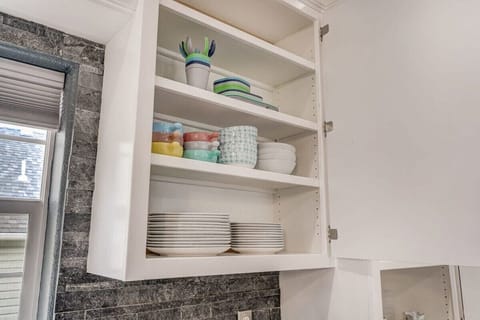 The fully stocked kitchen is sparkling clean and ready for you and your loved ones to cook till your heart's content!