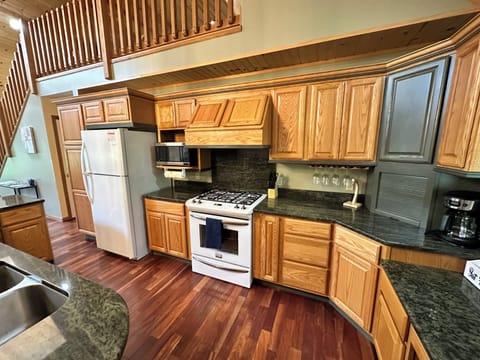 Fridge, Gas Stove, Microwave, Drip Style Coffee Pot. 