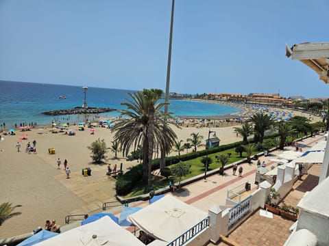 On the beach, sun loungers, beach towels