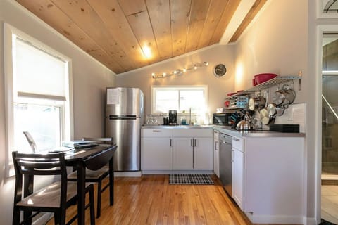 modern kitchen with dining table for two