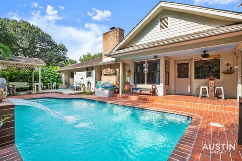 Beautiful backyard with pool, grill, and plenty of places to hang out