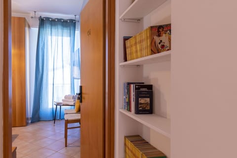 Property, Furniture, Shelf, Bookcase, Curtain, Window, Wood, Building, Shelving