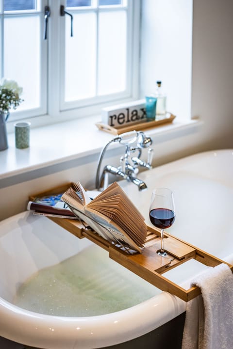 Bathtub, hair dryer, towels