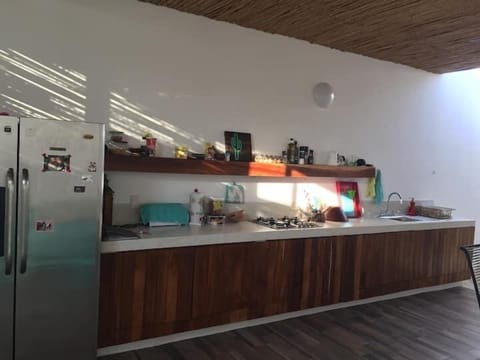 easy to cook in kitchen opens to living area