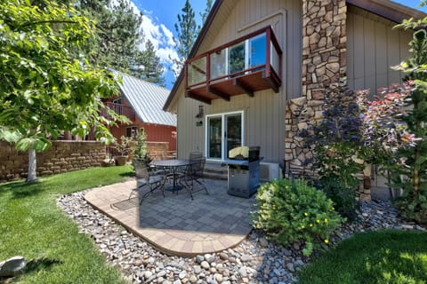 Backyard with patio and balcony off master