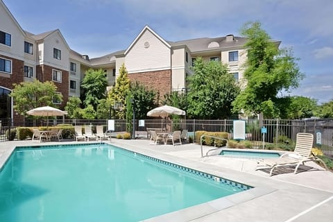 Soak up sunshine with a refreshing swim and loungers.