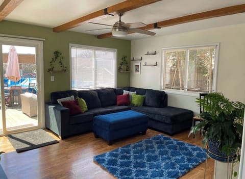 Living area #2 with L shaped couch and tv. 