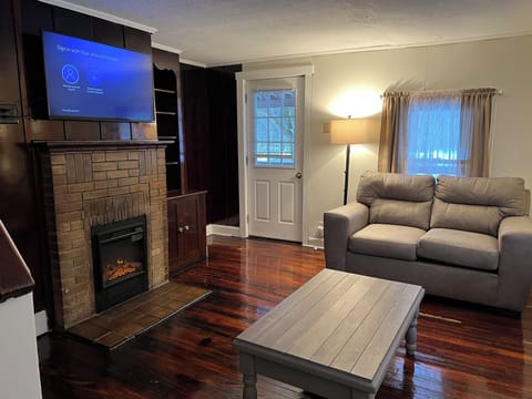 Smart TV, fireplace, books