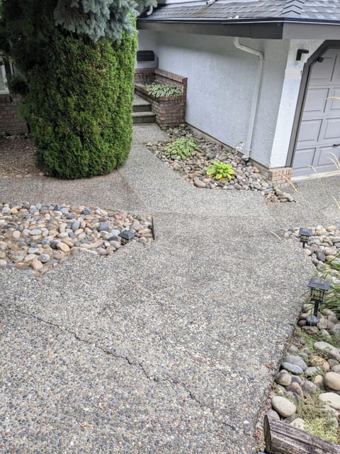 Front yard - stairs down to the suite