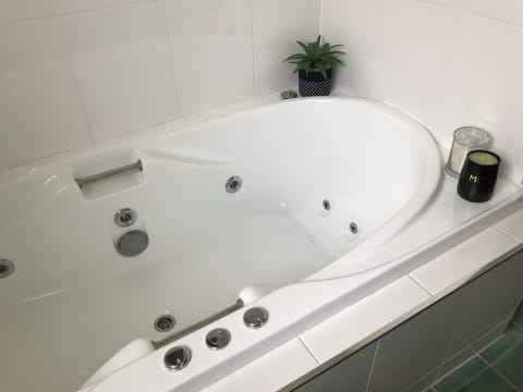 Jetted tub, eco-friendly toiletries, hair dryer, bathrobes