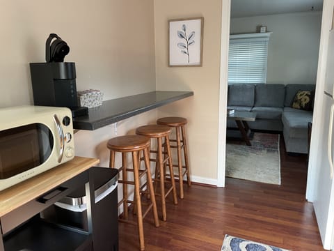 Kitchen w/ 3 barstools