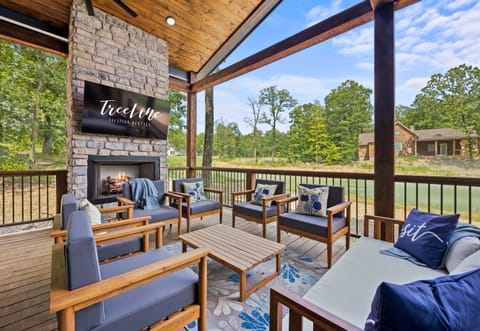 Cozy up by the outdoor fireplace and let the serene woodland views set the mood for an unforgettable evening at our tranquil escape.