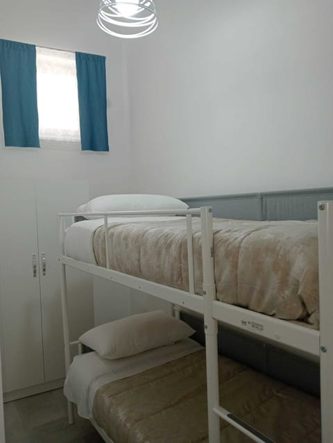 2 bedrooms, in-room safe, iron/ironing board, WiFi