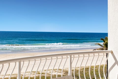 On the beach, sun loungers, beach towels