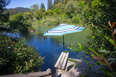 With an umbrella and a couple of benches, the dock is a an excellent summer hideout.