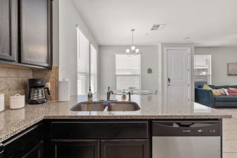A sleek and modern kitchen with granite countertops is perfect for any home chef