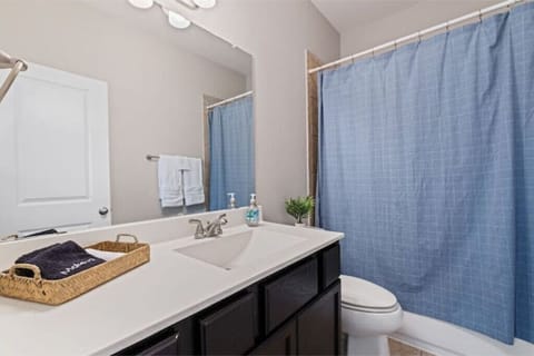 Combined shower/tub, hair dryer, towels, soap