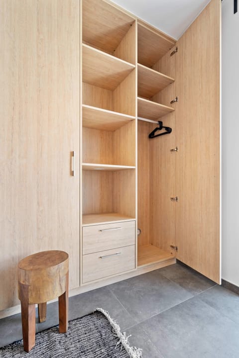 Spacious built-in closet with ample storage space, perfect for keeping your belongings organized during your stay.