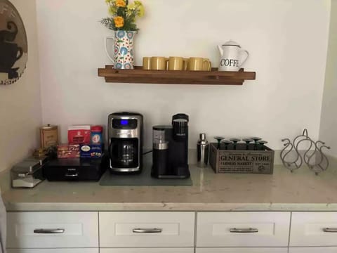 Coffee bar and wine storage area.