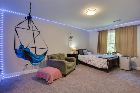 Bedroom 4 includes a hanging Eno chair.