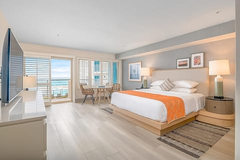 Wake up to ocean views from a serene king bed