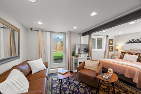 Seating area with electric fireplace & Roku TV