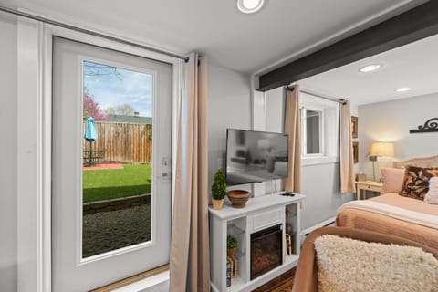 Door to private fenced in yard