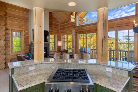 Aldasoro mountain range and Ski Run views from the kitchen. High-end appliances, Sub Zero and Wolf. 2 barstools at kitchen counter