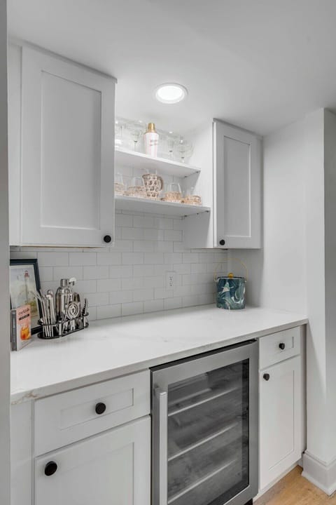 Our cocktail bar also includes a full wine cooler.