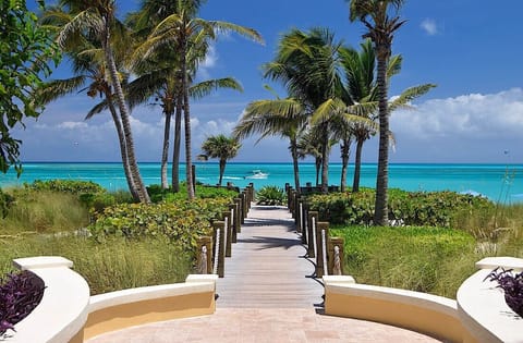 On the beach, sun loungers, beach towels