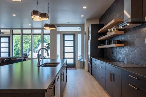 Kitchen- Insta-Worthy black on black with seating at the island. 
