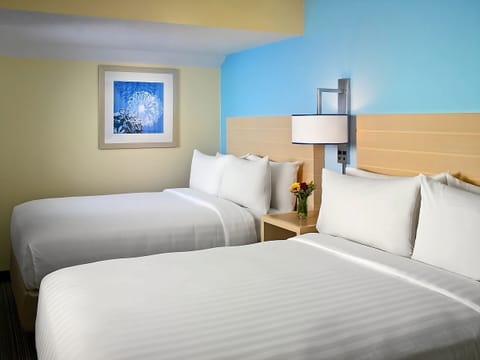 Unwind in crisp linens with plenty of space to recharge.