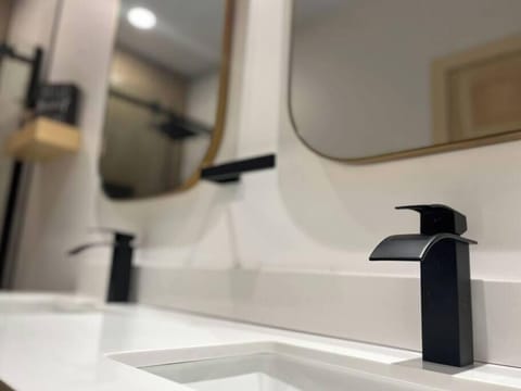 Plenty of space to get ready for the day or the night at the double vanity.