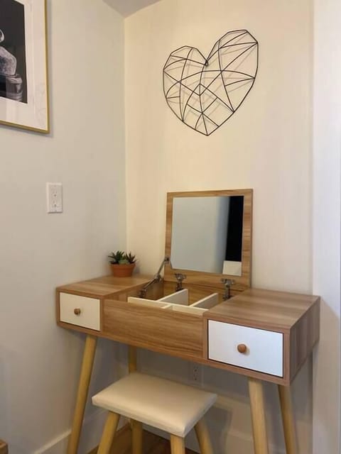 No need to hog the bathroom ladies - the master bedroom has it's own make-up station.