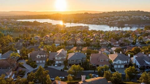 This spectacular home has striking views of Lake Mission Viejo, and local Saddleback Mountains. Sit on the Master room Balcony for amazing Sunrise, and Sunsets!