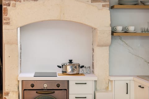 Maintaining some of its original elements the kitchen still maintains its beauty