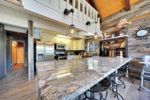 Kitchen with large bar.