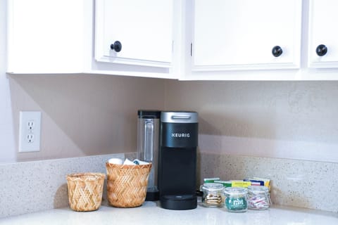 Keurig Coffee maker. Creamers, sugar and teas available.