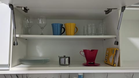 Fridge, microwave, stovetop, cookware/dishes/utensils