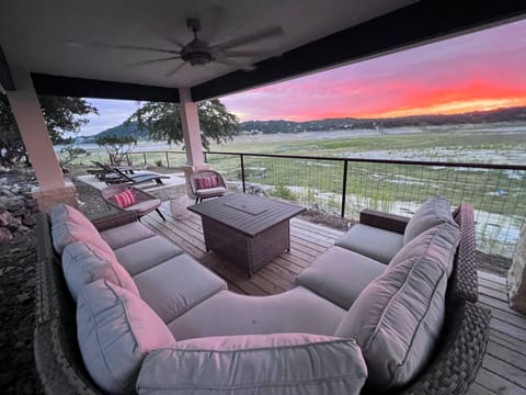 Pavillion on property with spacious seating, a fire pit and great views