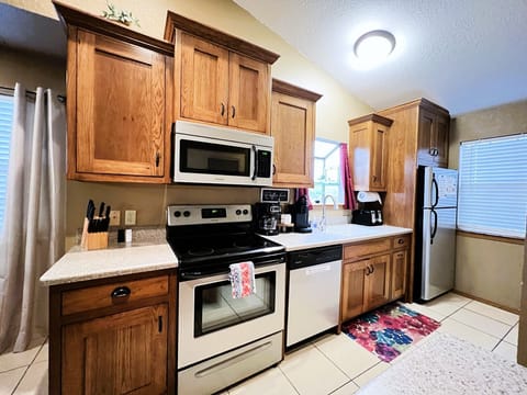 Get inspired to cook and entertain in the stylish and fully equipped kitchen, complete with all the modern amenities you need to whip up a delicious meal